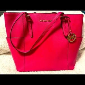Pink Michael Kors with gold decal